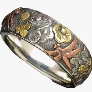 Nature-Inspired Silver and Gold Ring with Floral Accents